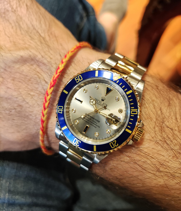 Rolex Submariner acciaio e oro  lunetta blu diamanti zaffiri 